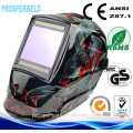 Solar power auto-darkening welding helmet